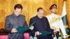Imran Khan (left) takes the oath of office as Pakistani prime minister with President Mamnoon Hussain in attendance on August 18. 