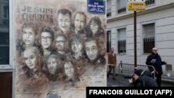 Mural francuskog umetnika Kristijana Guemija, poznatijeg pod pseudonimom "C215", sa portretima ubijenih karikaturista magazina Šarli Ebdo, nedaleko od redakcije magazina, Pariz