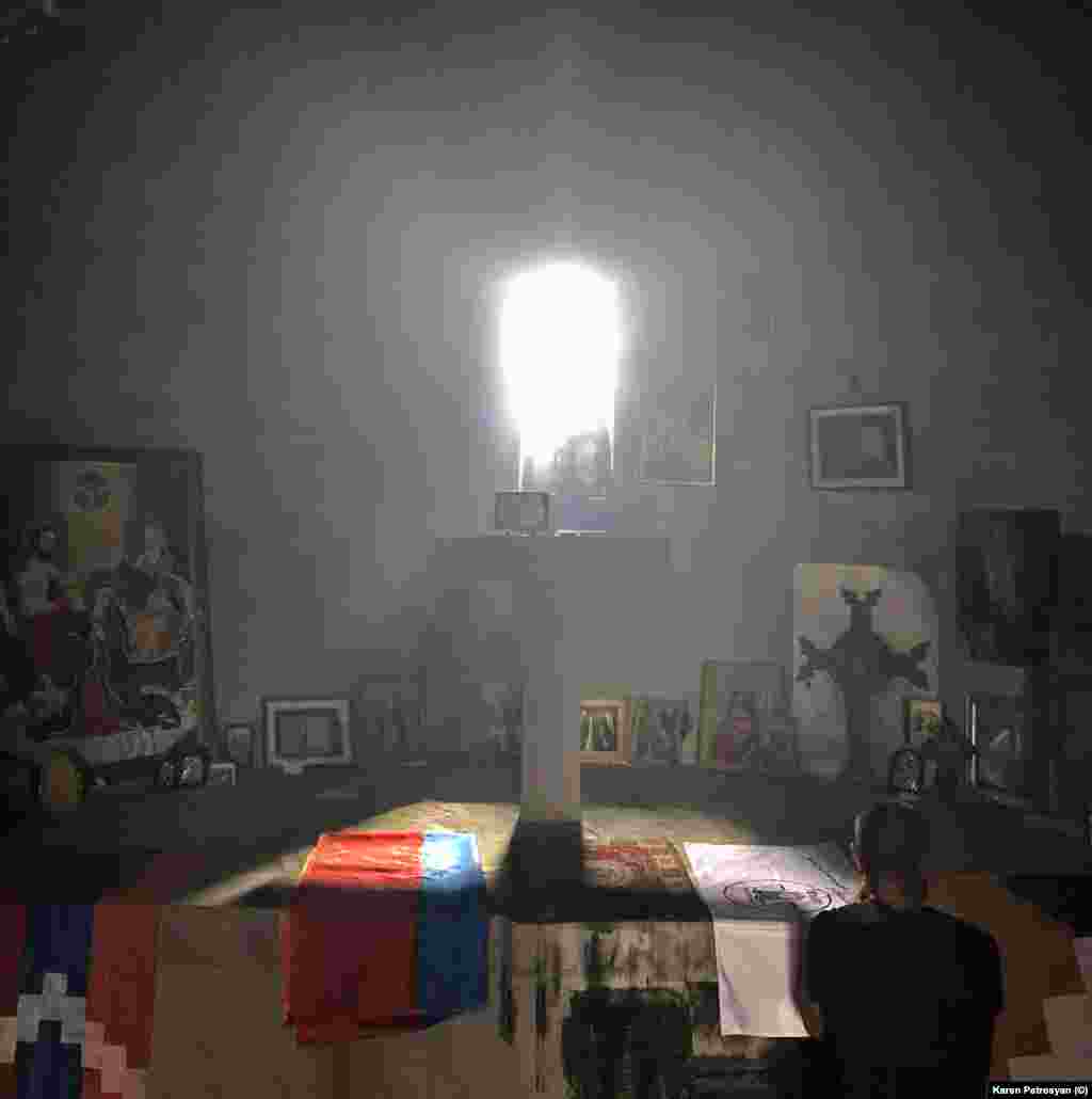 Visitors pray inside the Kataro monastery, which was completed in the 17th century. 