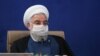 A handout photo made available by the presidential office shows Iranian President Hassan Rouhani wearing face mask during the cabinet meeting in Tehran, Iran, 08 July 2020.