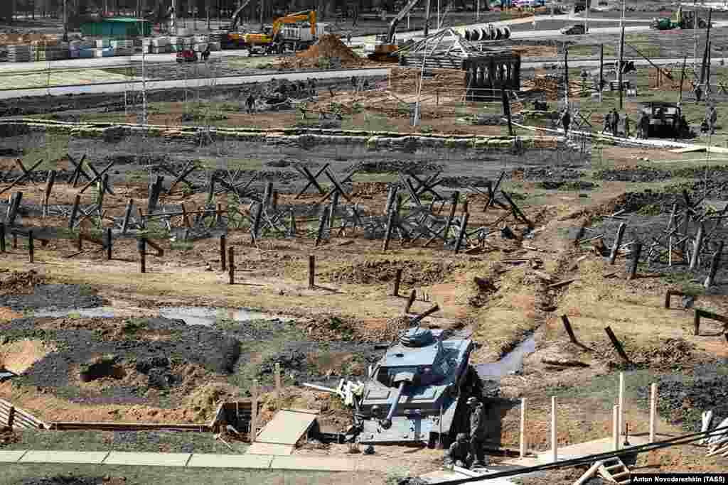 Nazi tanks and a minefield in the recreated battlefield on the cathedral grounds.&nbsp;