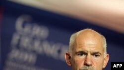 France -- Greek Prime Minister George Papandreou talks during a press conference following crisis talks with French President, German Chancellor, senior EU leaders and IMF director in Cannes, 02Nov2011