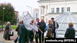 Officials disperse prisoners' mothers who were staging a protest on Minsk's Liberty Square. 