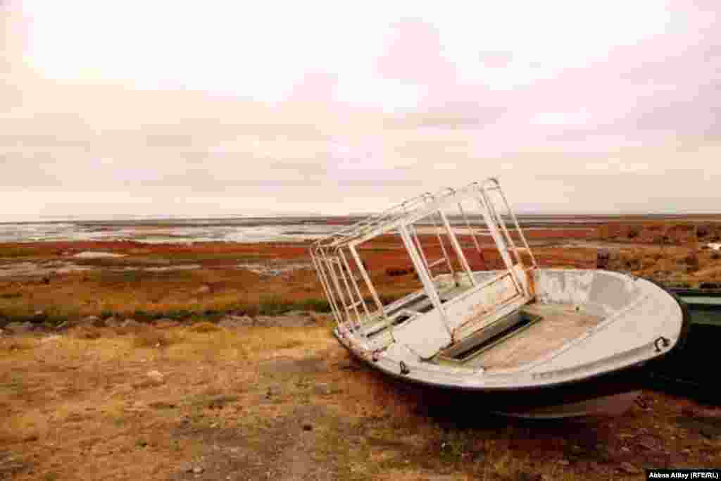 Stranded boats line what used to be the lake’s shores some 6 kilometers from the nearest water.