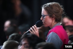 Russian journalist Ksenia Sobchak asks her controversial question during Russian President Vladimir Putin's annual press conference in Moscow.