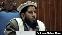 Fazal Hadi Muslimyar addresses senators after his election as Senate chairman in Kabul on March 11.