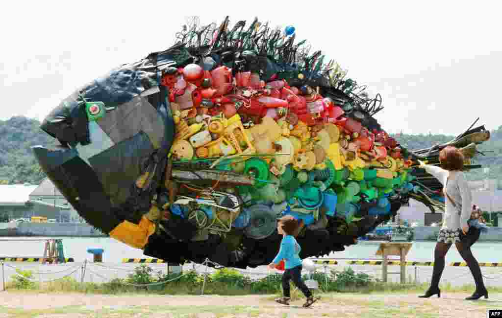 A large sea bream made from debris found adrift at sea by the Japanese art group Yodogawa Tecnique is displayed at the Setouchi Triennale art event in Uno, Okayama. (AFP/Jiji Press)