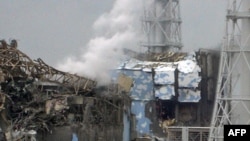 The damaged third and fourth reactors of the TEPCO Fukushima No.1 power plant in Fukushima on March 16