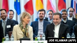 عباس عراقچی و هلگا اشمیت در یکی از نشستهای قبلی کمیسیون مشترک برجام