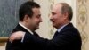 Outgoing Serbian Prime Minister Ivica Dacic (left) with Russian President Vladimir Putin. Dacic is reportedly the Kremlin's closest ally in Belgrade. 