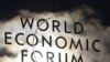 Logo Svetskog ekonomskog foruma na prozoru Kongresnog centra u Davosu, 25. januar 2011.