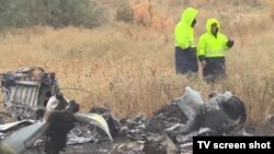 Санавиацияның Ан-28 ұшағы құлап, борттағы бес адам түгел қаза болған апат орнынан түсірілген видеоның скриншоты. Алматы маңы, 5 қазан 2017 жыл.