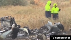 Санавиацияның Ан-28 ұшағы құлап, борттағы бес адам түгел қаза болған апат орнынан түсірілген видеоның скриншоты. Алматы маңы, 5 қазан 2017 жыл. 