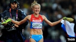 Yulia Zaripova shortly after crossing the line first in the 3,000-meter steeplechase final at the 2012 London Olympics. 