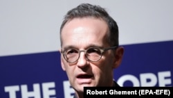 German Foreign Minister Heiko Maas speaks during a joint press conference with his French and UK counterparts, in Bucharest, on Iran trade mechanism. January 31, 2019