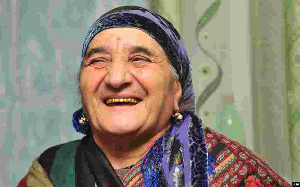 Armenia -- A elderly woman, member of Yezidi community, smiles at home in the Armenian village of Zovuny, 01May2013