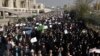 Iranian protesters chant slogans at a rally in Tehran last month.