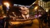 UKRAINE -- Activists of various nationalist parties carry torches and a portrait of Stepan Bandera during a rally in Kyiv, Ukraine, Wednesday, Jan. 1, 2020