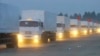 A screen capture of a Russian convoy of trucks that Moscow says is carrying humanitarian aid for Ukraine sets off from near the Russian capital on August 12.