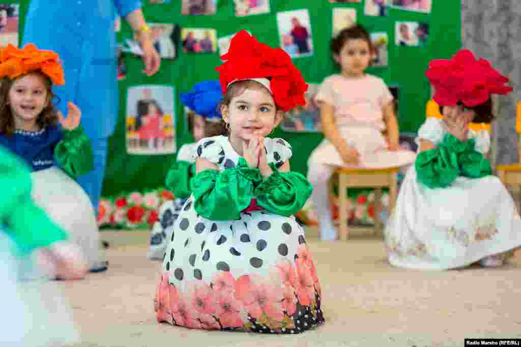 Children in Chechnya rehearse a ceremony to honor their mothers ahead of International Women's Day on March 8. (RFE/RL)