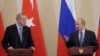 Russian President Vladimir Putin (R) and Turkish President Recep Tayyip Erdogan (L) attend a joint news conference following Russian-Turkish talks in the Black sea resort of Sochi, Russia, October 22, 2019