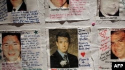 Фотографии погибших в терактах 11 сентября 2001 года, выставленные в мемориальном комплексе в Нью-Йорке.