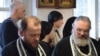 Священник Валерий Рассадин - справа