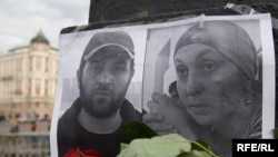 A makeshift memorial to Alik Dzhabrailov and Zarema Sadulayeva of the Save The Generations charity, murdered in Chechnya last month