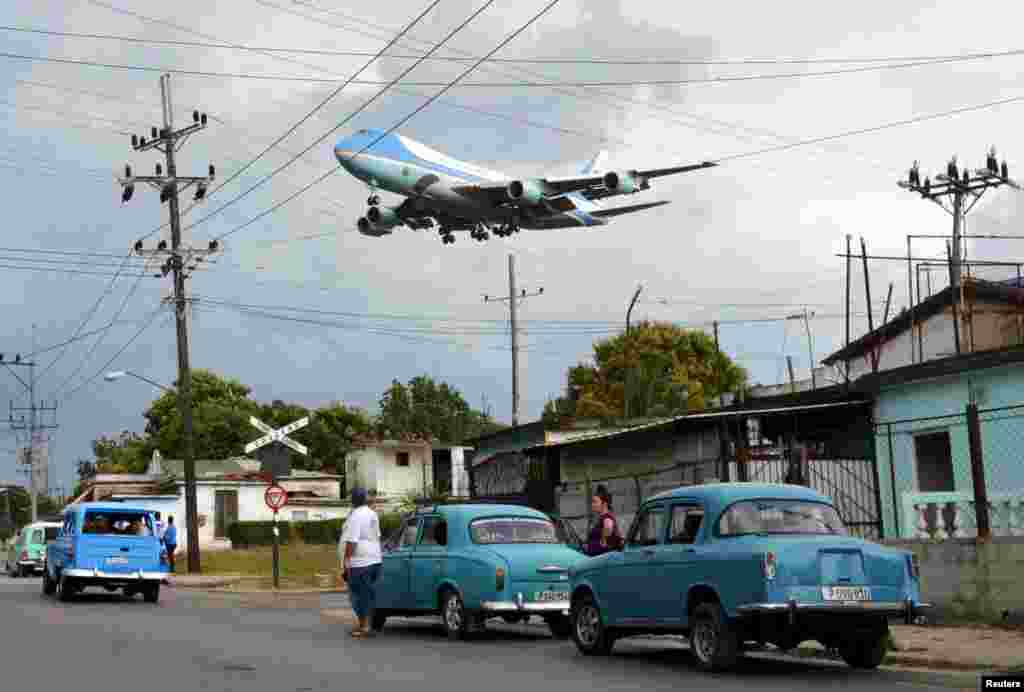 When U.S. President Barack Obama made his historic visit to Cuba in March, Reuters photographer Alberto Reyes knew exactly where he needed to be. &nbsp; He writes that &quot;a motorcyclist from the neighborhood, who had been hired by Reuters, showed me the spot where it would be possible to see the plane if it came in from that angle.&quot; &nbsp; &quot;I knew the exact spot when I saw the White House advance planes coming in before Air Force One. There were a lot of people on the street waiting for the plane. It was an important moment for many. One neighbor shouted out to me that the plane was coming in before I could hear the turbines. &quot;The neighbor who was shouting, the clamor of the people, the roar of the plane&#39;s engines, the sheer size of it so close to the houses, and the brief moments I had to take this picture, made this moment unforgettable to me.&quot;