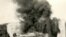 A Hungarian soldier torches a bunker on an abandoned defensive line between Romania and Hungary in 1940.