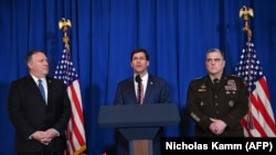 US Secretary of State Mike Pompeo (L), Secretary of Defense Mark Esper (C) and Chairman of the Joint Chiefs of Staff Mark A. Milley (R) speak during a briefing on the past 72 hours events in Mar a Lago, Palm Beach, Florida on December 29, 2019