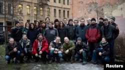 Twenty-six members of what Greenpeace came to dub its "Arctic 30," including 24 Greenpeace International activists and two freelance journalists -- in an undated photo in St. Petersburg