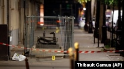 Evidence is seen at the site of a knife attack in Paris on September 10.