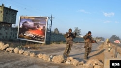 Indian security personnel stand outside the air base in Pathankot, Punjab, on January 5.