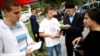 Volunteers hand out leaflets with information about new Bosnia's census in Jablanica, 60 kilometers south of Sarajevo, in September 2013.