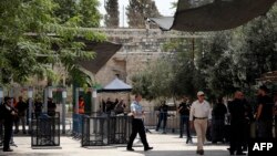 Security measures outside a Jerusalem holy site have led to protests in the city.