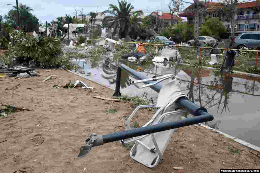GREECE WEATHER STORMS -- Destroyed chairs and umbrellas are seen after heavy storms hit Nea Plagia, Chalkidiki, northern Greece, 11 July 2019. 