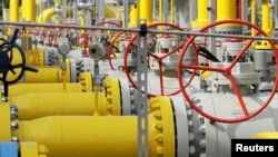 Poland -- Valves and pipelines are pictured at the Gaz-System gas distribution station in Gustorzyn, central Poland, September 12, 2014