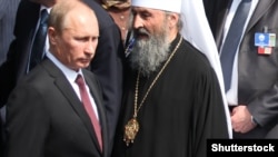 Владимир Путин и митрополит Онуфрий