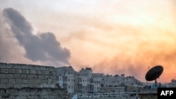 Дым над кварталом сирийского города Алеппо. 29 октября 2016 года.