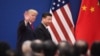 China -- US President Donald Trump (L) and China's President Xi Jinping leave a business leaders event at the Great Hall of the People in Beijing on November 9, 2017. Donald Trump urged Chinese leader Xi Jinping to work "hard" and act fast to help resolve