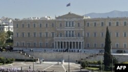 Tens of thousands of demonstrators gathered in front of the Greek parliament in Athens on October 20.