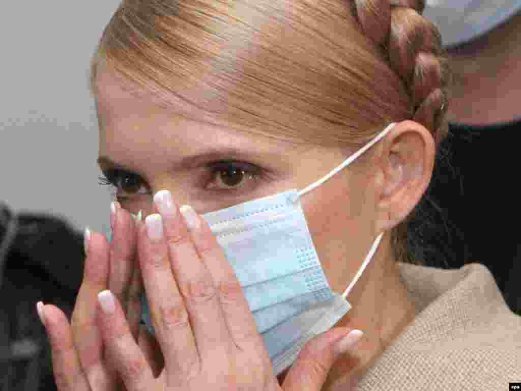 Wearing a protective mask during a visit to a hospital in Ivano-Frankivsk.