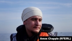 Дауд Дауд, беженец из Сирии, прибывший на остров Лесбос. 29 февраля 2016 года.