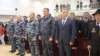 Заместитель министра внутренних дел Ингушетии Юрий Муравьев (в гражданской одежде справа) с сотрудниками и ветеранами МВД на концерте