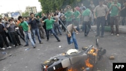 Musavi supporters protest in the streets of Tehran.