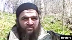Has Doku Umarov (in video said to be from earlier this year) resisted a forced resignation, or just reevaluated his decision?