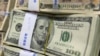 South Korea -- Stacks of US 100 dollar notes are pictured at the headquarters of the Exchange Bank in Seoul, 02Aug2011