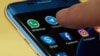 Start telegram application icon on smartphone screen close-up. Close to 40 million Iranians use the app, which plays a central role in keeping people informed about events.