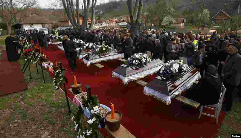 Hundreds Mourn As 13 Victims Of Shooting Rampage Buried